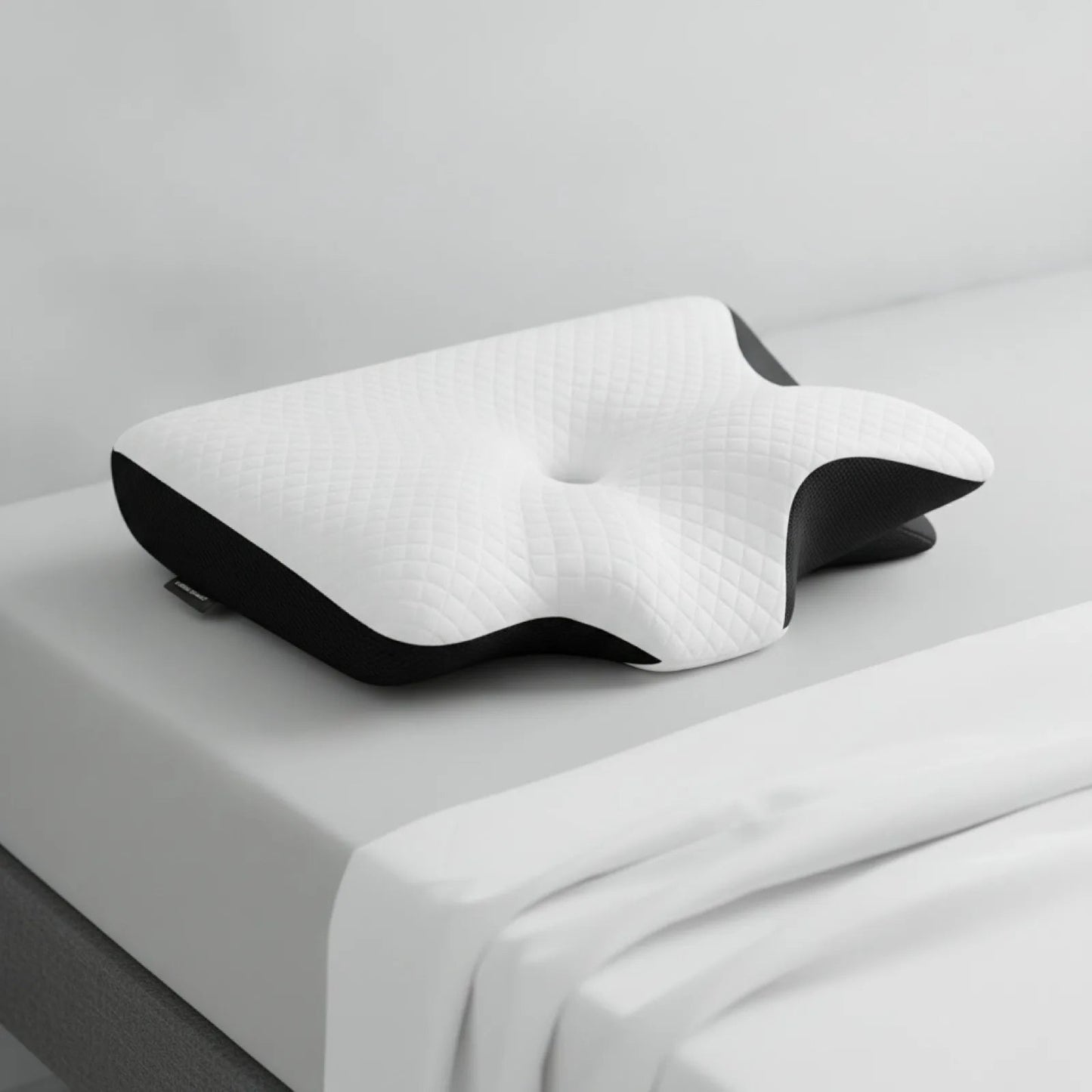Oreiller cervical ergonomique ChronoStyle en mousse à mémoire de forme blanc et noir avec housse respirante texturée